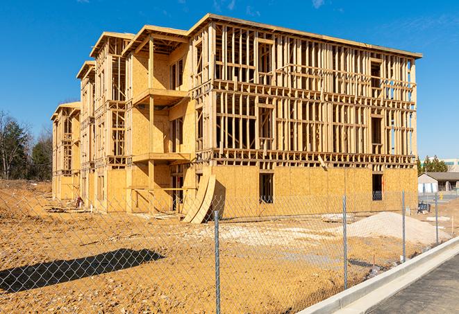 a temporary chain link fence locking away a building under renovation, serving as a security tool in Rosemead, CA